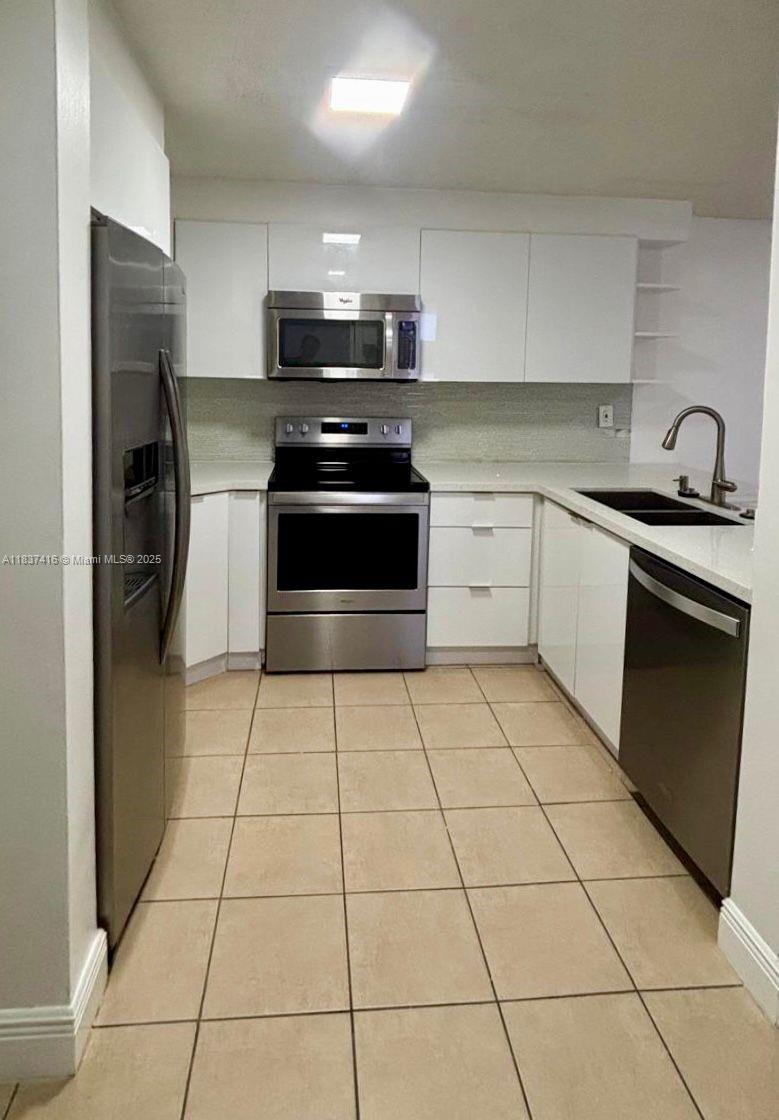 210 SW 11th St 410