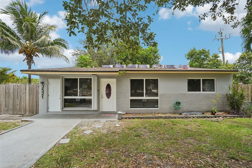 Use this home as a 3 bedroom 2 bath or split  for income producing as a 2/1 and a 1/1. This beauty features a brand new roof, impact windows, fully fenced in yard, and best of all, no association. This is in the highly desired Hollywood area. The yard has room for a boat or RV. You can live on one side and rent the other or open it up as a full home. Call today for a private tour. This is a great property and wont last long! Please note the home may be larger than what the tax roll reflects**