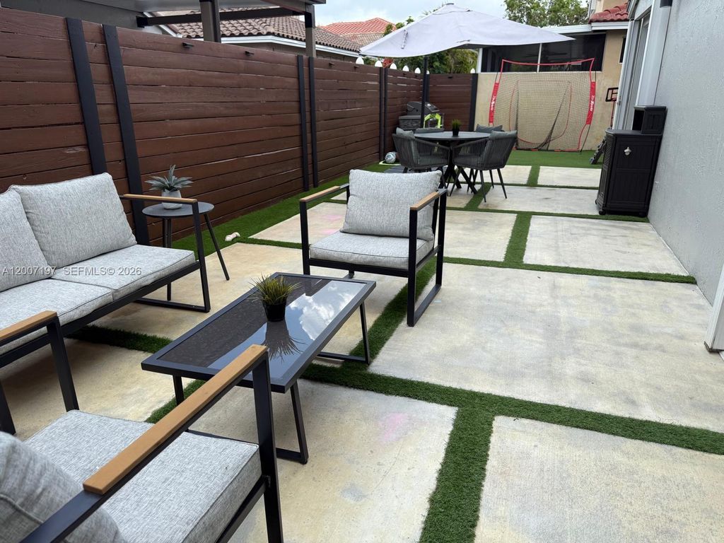 Photo of 16263 NW 19th St, Pembroke Pines, FL 33028 (MLS # A12007197)