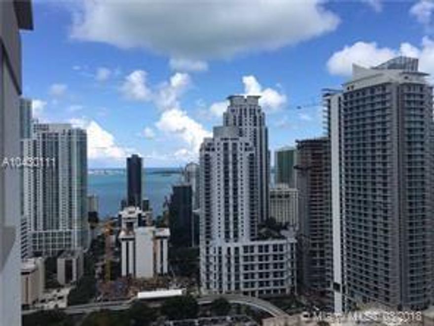 Beautiful unit at Nine with all Brickell has to offer at your doorstep! Spacious corner unit with 1366 SF and great layout with split plan and sweeping bay views from every room.  Wood look porcelain floors throughout.  Amenities deck features pool, gardens, BBQ area, gym, business center, party room, etc.  Easy to show, Call listing agent.  AVAILABLE 4/1/18.
