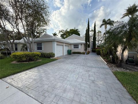 Photo of 1040 Wilshire Cir W, Pembroke Pines, FL 33027 (MLS # A11879134)