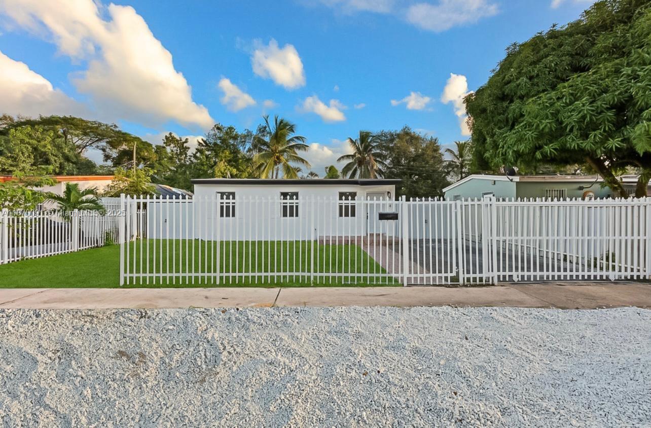 Beautifully renovated 4-bedroom, 3-bathroom single-family residence offers the perfect blend of modern design and everyday comfort. Step inside to find an open-concept living space flooded with natural light, featuring luxury vinyl flooring, LED lighting, and a spacious modern kitchen complete with quartz countertops, custom cabinetry, and brand-new stainless steel appliances. NO HOA! All three bathrooms have been completely updated with contemporary finishes, floating vanities, and sleek tilework. Brand new electrical and HVAC system. Located just minutes from Hard Rock Stadium, major highways, shopping, and dining, this home offers both convenience and comfort in one of Miami-Dade's fastest-growing communities. Move-in ready—don’t miss the opportunity to make this stunning home yours!