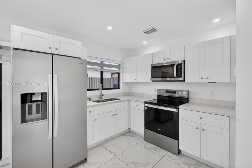 Available for Immediate Rental! Rapid Approval process. Modern 2022-built 3-bedroom, 2-bath residence offering bright, open living with sleek porcelain flooring throughout and a clean, contemporary design. The spacious layout provides comfort and privacy, complemented by impact windows and doors and solid CBS construction for peace of mind. Enjoy ample parking and a generously sized lot. Ideally located in a high-demand Miami area just minutes to major highways, Downtown, Wynwood, Miami International Airport, and public transportation. No HOA, fast approval, and available for immediate rental.