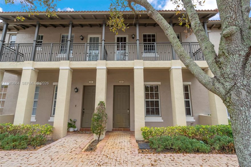 One of the nicest townhomes in the highly sought-after Cobblestone community! This beautifully renovated 2-bedroom, 2.5-bath home features a spacious layout and has been completely updated with a modern kitchen featuring quartz countertops and stainless steel appliances, renovated bathrooms, upgraded flooring, custom accent walls, and additional built-in storage. Enjoy your mornings on the private balcony connected to the main bedroom, along with the convenience of two assigned parking spaces with rear access. Residents enjoy a 24-hour guard-gated entrance, clubhouse, community pool, fitness center, and playground area. Ideally located near banks, grocery stores, shopping, restaurants, and top-tier schools with easy access to major highways.