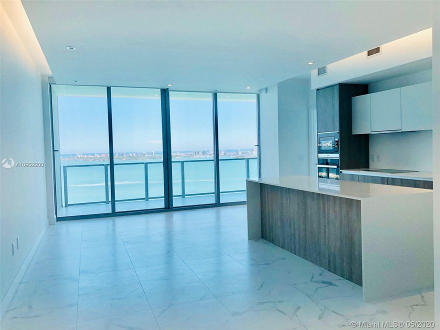 Live in this 2 bed / 2.5 bath at Biscayne Beach with stunning direct bay and Miami Beach views. Unit features private elevator and foyer entrance with upgraded finishes, Snaidero kitchens, Miele appliances, custom amenities including fitness center, spa, kids room, club room, theater, tennis, basketball, beach volleyball, two pools, beach cabanas, dock, concierge and 24 hours security and valet. Close to Wynwood, Design District, Miami Beach, Downtown and Brickell.