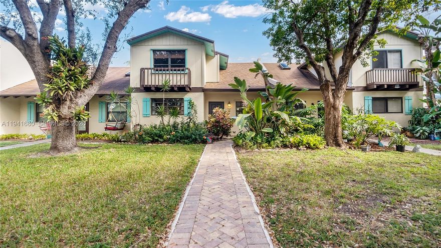 Welcome home to this beautifully updated 3-bedroom, 2-bath townhome in a boutique community east of US-1 in highly desirable Dania Beach. The bright, open interior features vaulted ceilings with exposed beams, an easy-flow layout, and a sunlit kitchen with stainless steel appliances and tile flooring throughout. The primary suite includes a private balcony overlooking a protected mangrove greenbelt that extends to the Intracoastal Waterway. The en-suite bath feels like a private retreat, complete with a soaking tub, separate shower, oversized walk-in closet, and a unique rooftop patio. A first-floor bedroom and full bath provide flexibility for guests or a home office, while two additional bedrooms and the laundry area are conveniently located upstairs. Enjoy outdoor living on the fenced patio, perfect for relaxing or entertaining. Recent upgrades include a 2022 roof, 2023 A/C, and a backyard storage shed. Ideally situated near Dania Beach Pier, Harbortowne Marina, Casino @ Dania Beach, Dania Pointe, and the airport, this quiet community features mature trees, low HOA fees, and two parking spaces right at your door.