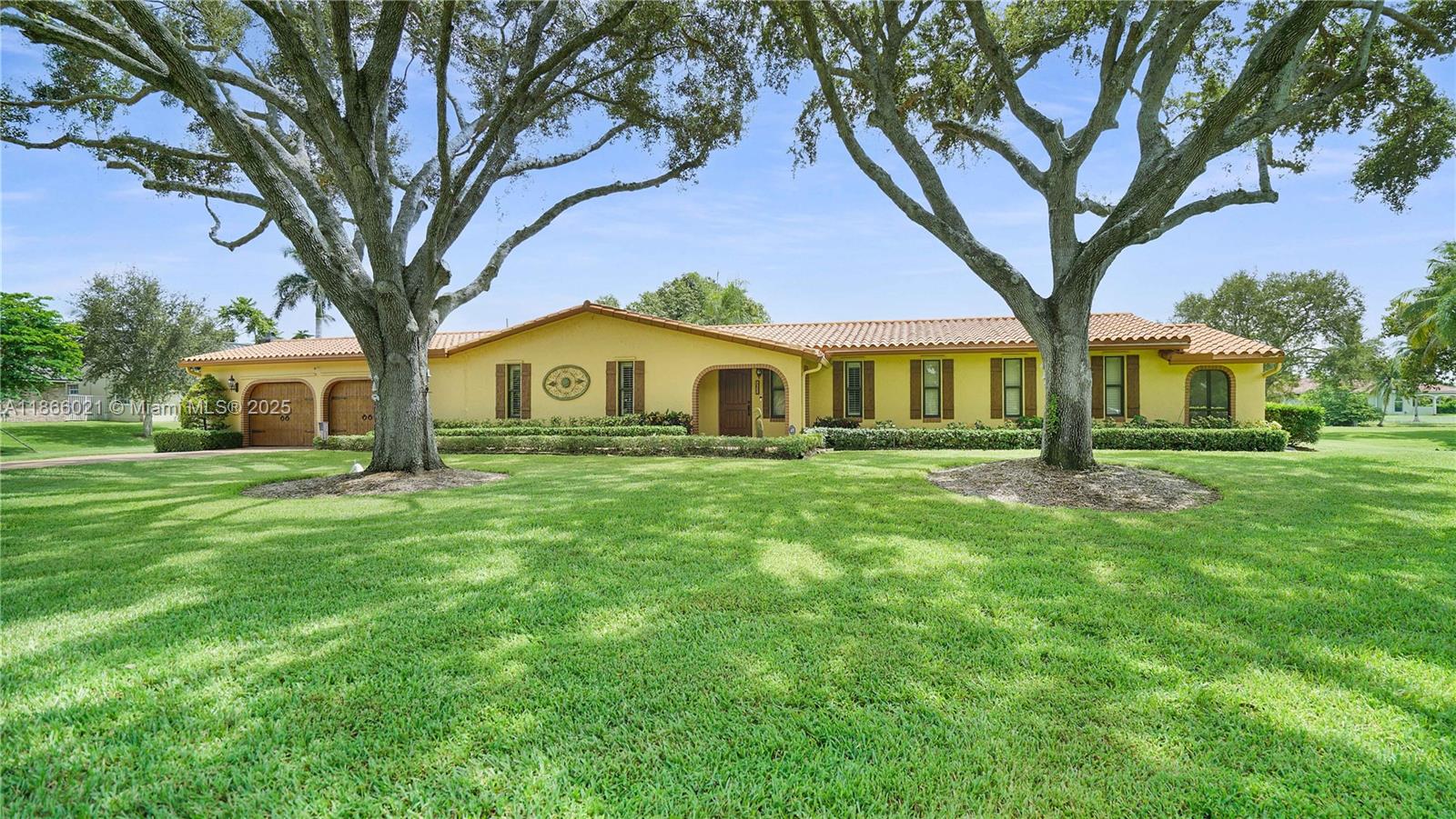 Welcome to Davie West! Your Ranch Waterfront pool home on 1.43 acres! Horse friendly community with access to horse trails to Davie parks. Your private canal retreat features 4 bedrooms and 2 baths/2.5 car garage that includes s/s cabinetry. Extended paved driveway with private parking behind the garage. Home features custom kitchen, quartz countertops, s/s appliances (double convention oven), built-in wine bar, and a spacious island perfect for entertaining. The primary suite has a private screened patio overlooking the lake, where egrets frequently visit. Hurricane impact doors and windows with accordion shutters on three sliders. This home includes luxury, privacy, and natural beauty, with waterfront amenities- boating, fishing, jet skiing and water skiing from your own backyard!