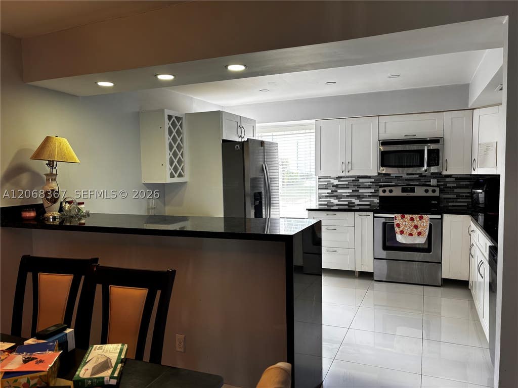 Photo of Boca Raton, FL 33433 (MLS # A12068367)