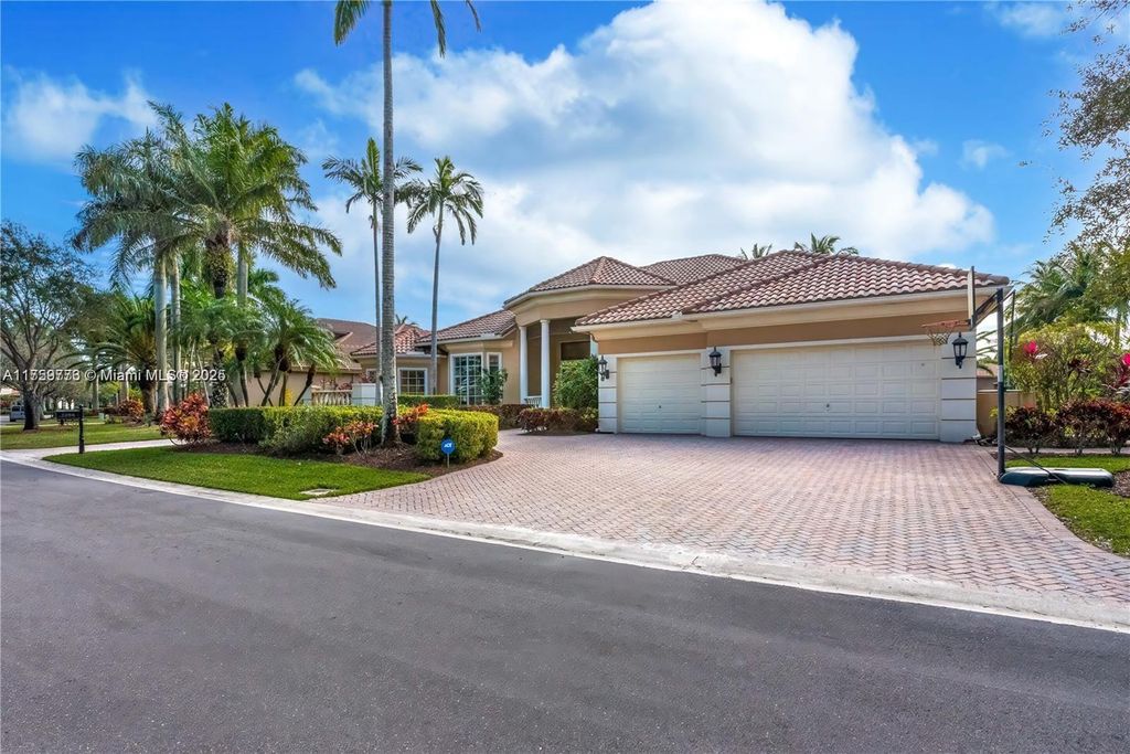 Photo of 7256 NW 127th Way, Parkland, FL 33076 (MLS # A11759773)