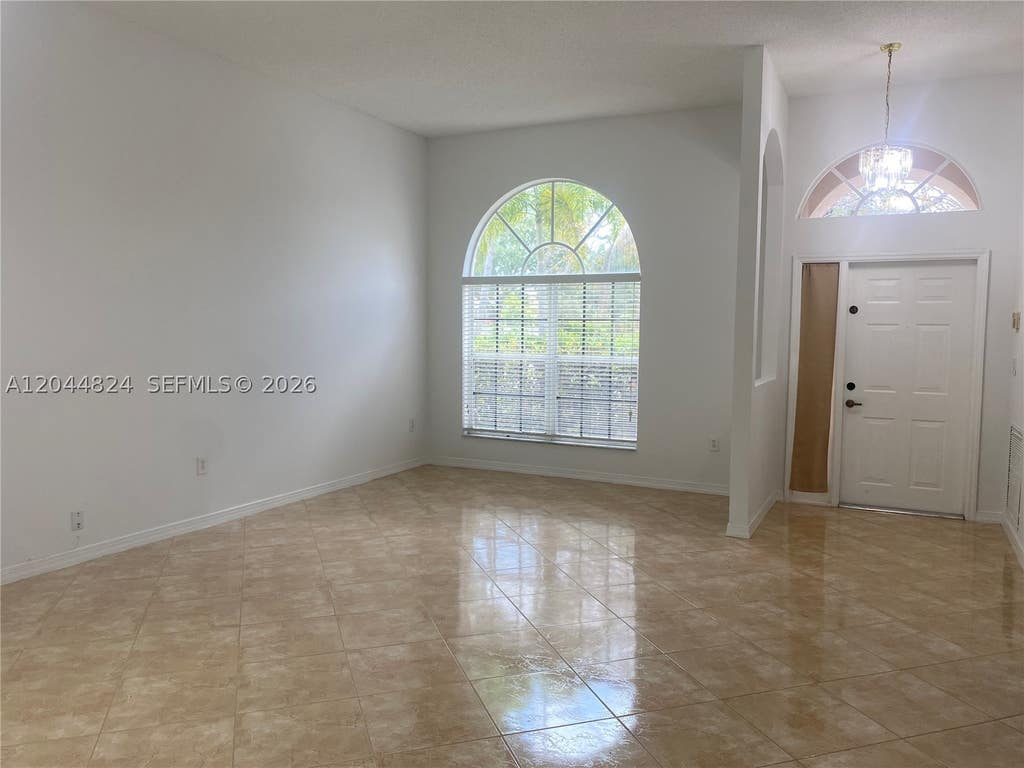 Photo of 1315 NW 143rd Ave #1315, Pembroke Pines, FL 33028 (MLS # A12044824)