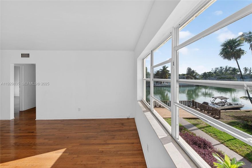 Wake up to tranquil canal views at 160 S Shore Dr #5—a bright 2BR/1BA in Normandy Isles’ most charming waterfront pocket. Large picture windows bring in gorgeous natural light and frame the water from the living spaces, while classic wood floors add warmth and timeless Miami character. The kitchen is clean and functional with crisp white cabinetry and generous counter space, and the bathroom features vintage charm with tasteful updates. Enjoy a boutique, garden-style setting with a lush courtyard and a true “old Miami” feel—just minutes to the beach, Normandy Isle amenities, and all the dining/shopping of North Beach and Bal Harbour. Please call Brandon Saballos (786) 564-6861 or Ryan (305) 746-3860 with any questions or to schedule a showing.