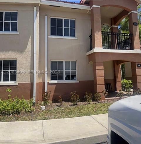 Photo of 3500 Briar Bay Blvd #106, West Palm Beach, FL 33411 (MLS # A12063564)
