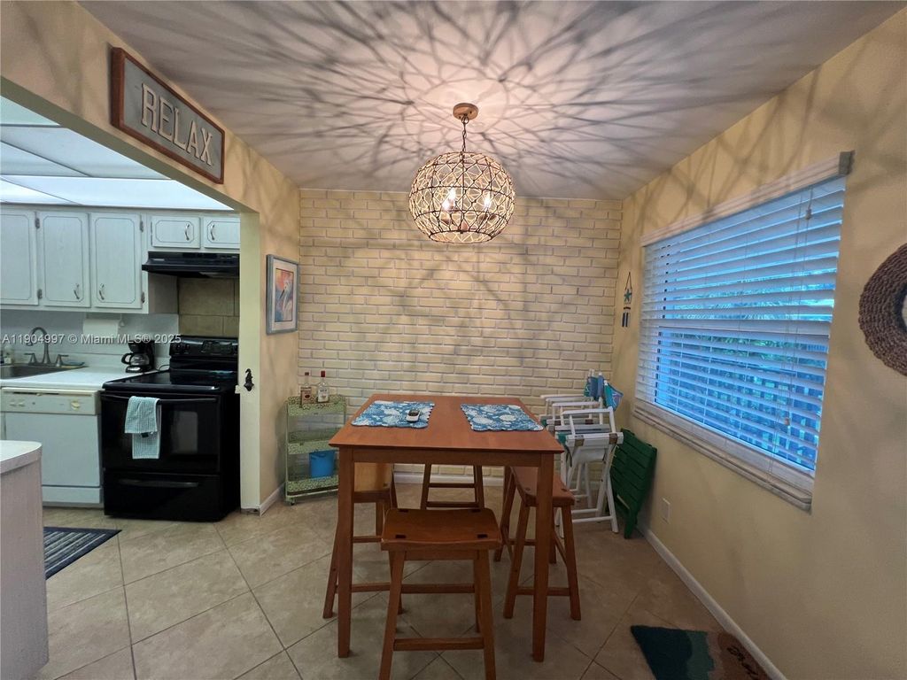 Photo of 108 Bravado Ln #8, Palm Beach Shores, FL 33404 (MLS # A11904997)