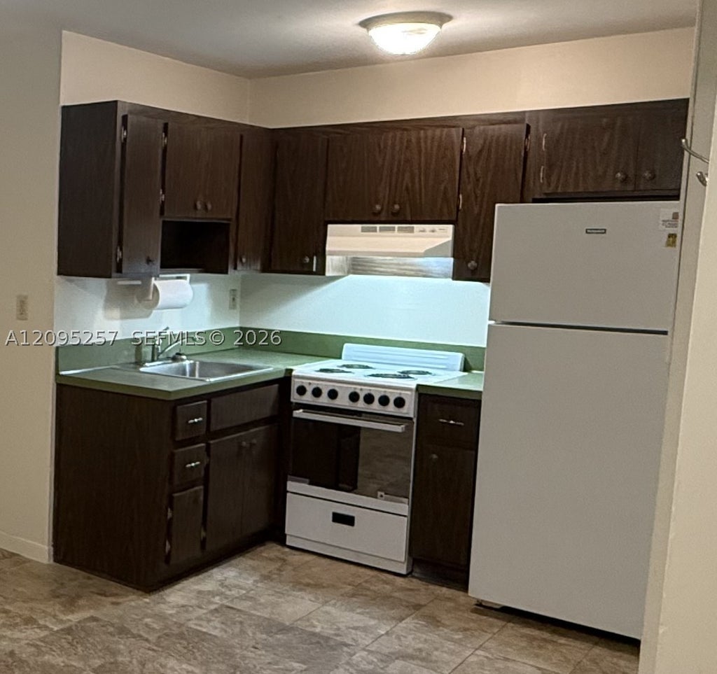 Photo of 2400 SW 42nd Ave #1-6, Fort Lauderdale, FL 33317 (MLS # A12095257)