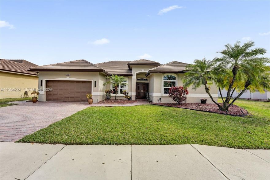 YOUR PERSONAL OASIS IN PEMBROKE PINES! THIS TURN-KEY READY HOME HAS EVERY UPGRADE IMAGINABLE AND THE WIDE LAKE VIEWS ARE BREATHTAKING! YOUR MORNING CUP OF COFFEE COMES WITH A STUNNING SUNRISE OVER THE LAKE. THIS GORGEOUS HOME IS SITUATED ON AN OVERSIZED LOT AND HAS A NEW ROOF (OCT. 2022). A PERGOLA WAS ADDED ONTO THE HOUSE (2015) IN ORDER TO ENLARGE THE OUTDOOR LIVING SPACE. YOU'LL LOVE THE IMPACT WINDOWS & DOORS THROUGHOUT, RECESSED LIGHTING, 12-FOOT CEILINGS, NEW AC (MAY 2025) & WATER HEATER (APRIL 2024), RENOVATED KITCHEN & BATHROOMS (2022), BEAUTIFUL PORCELIN FLOORING, A SPLIT BEDROOM FLOOR PLAN AND AN OUTDOOR SUMMER KITCHEN, ALONG WITH A SALT WATER POOL & SPACIOUS PATIO, COMPLETE WITH A TIKI HUT THAT HAS A NEW SYNTHETIC ROOF THAT'S FIREPROOF, WATERPROOF & MEETS WIND CODE (2024). EVERY SQUARE FOOT OF THIS HOME HAS BEEN THOUGHTFULLY & BEAUTIFULLY DESIGNED, INCLUDING AN ADDITIONAL ROOM ADJACENT TO THE PRIMARY BEDROOM, WHICH HAS BEEN REMODELED INTO A HUGE CUSTOM WALK-IN CLOSET. THIS HOME IS TRULY SPECIAL AND ONE-OF-A-KIND.