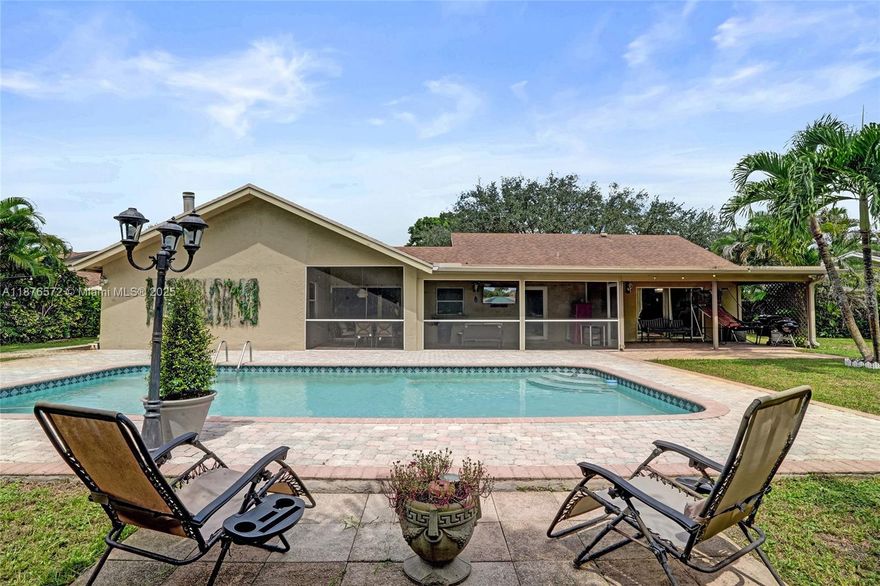 Cul-de-sac pool home in Rock Creek! 3-bed, 2-bath on 13,000+ sq ft lot backing greenbelt. Vaulted ceilings, quartzite counters, 2022 appliances, and updated finishes throughout. Screened patio, paved pool deck, 2-car garage. $200 quarterly HOA—lowest in area! Parks, trails, tennis, and top-rated schools nearby. Motivated seller offering $2,500 toward closing costs—don’t miss this value-packed gem!