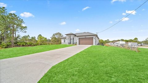 Tiny photo for 705 8th Ave, Lehigh Acres, FL 33972 (MLS # A12027873)