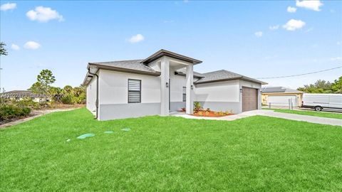 Tiny photo for 705 8th Ave, Lehigh Acres, FL 33972 (MLS # A12027873)