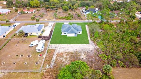 Tiny photo for 705 8th Ave, Lehigh Acres, FL 33972 (MLS # A12027873)