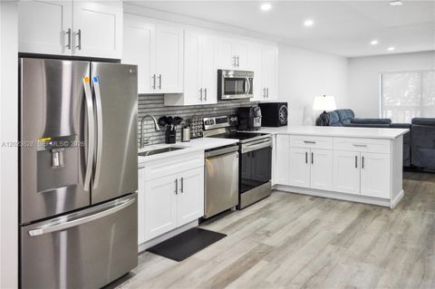 Photo of 1021 Mockingbird Ln #202, Plantation, FL 33324 (MLS # A12023628)