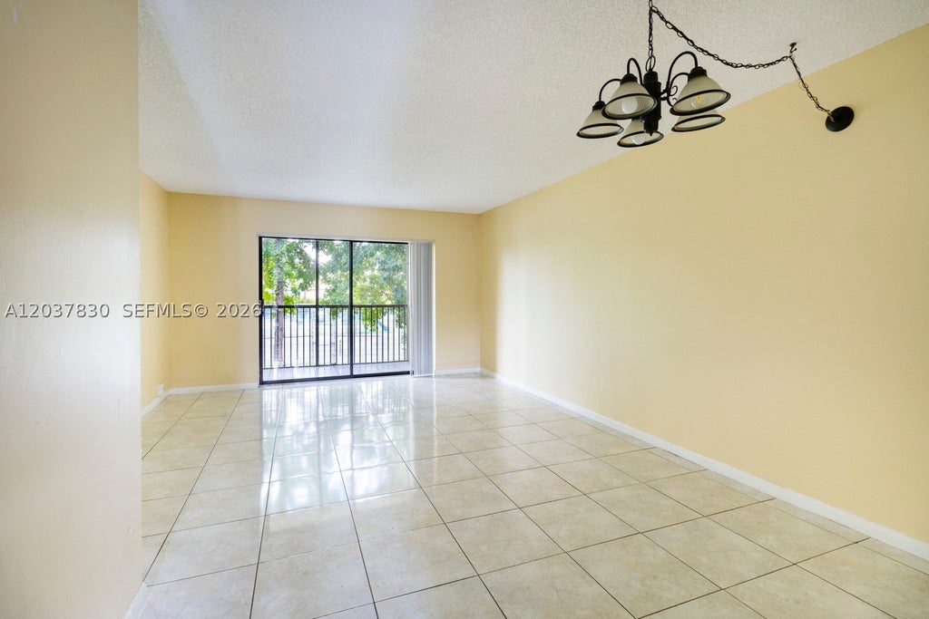 Photo of 9022 NW 28th Dr #2-310, Coral Springs, FL 33065 (MLS # A12037830)