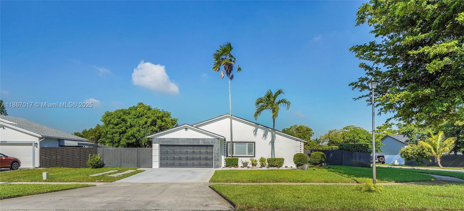Stunning 5-bedroom, 3-bathroom corner home featuring impact windows and doors, a double garage, and parking for more than 4 cars. Enjoy dual side entrances with room for your RV and boat, plus a huge backyard with a landscaped garden, perfect for entertaining, kids, and pets. The spacious layout also offers the option to create a private in-law quarter for extended family or guests. Located in a desirable community with a private park and very close to parks, schools, and major highways, including the Palmetto, Turnpike, I-75, and I-95, this home truly combines comfort, convenience, and lifestyle in one unique property.