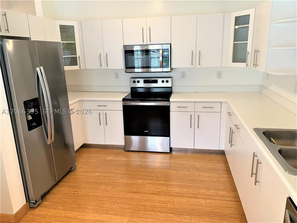 Photo of 1130 Buttonwood Ln #-, Hollywood, FL 33019 (MLS # A12066395)