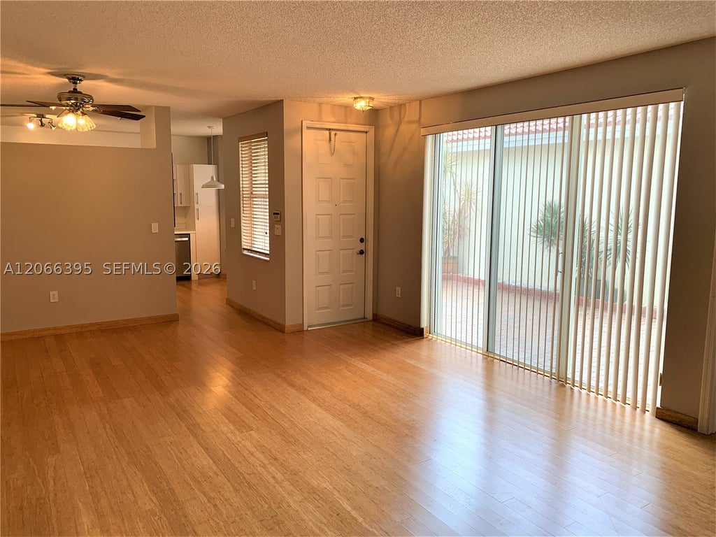Photo of 1130 Buttonwood Ln #-, Hollywood, FL 33019 (MLS # A12066395)