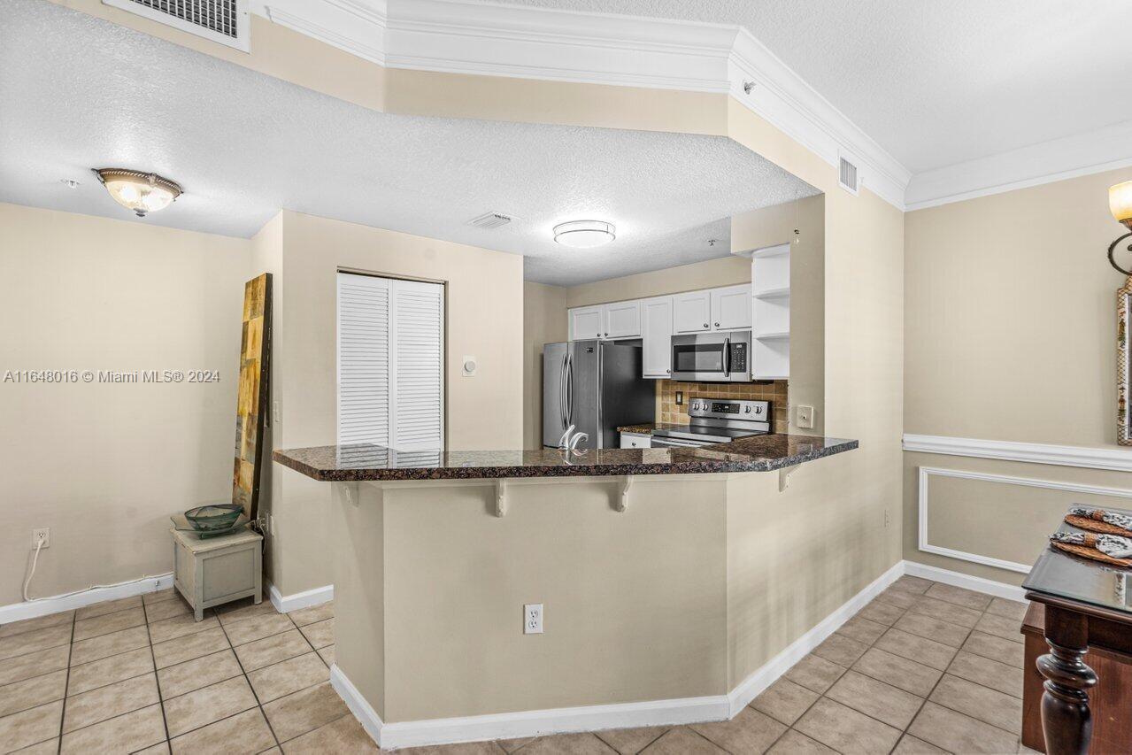 SOMERSET AT ABACOA CONDO - Residential