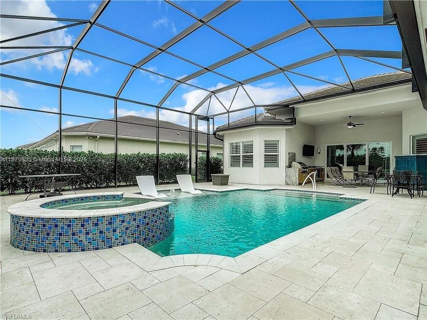 This Charleston Grande has 3354 SF under air and a total of 5785 SF. 3 Bedrooms, A Club/Den Room and 4 FULL BATHS! The Saltwater pool is one of the largest pools in the community. Attached is a long list of extras. Some upgrades are a full outdoor Kitchen, Luxury Tile, 24K Whole house Generator system, Tankless HW, Custom Closets, Storage room with a 20amp circuit, UV Air Sanitizer and Purifier on high efficiency AC units, Culligan whole home water treatment system, Plantation Shutters and MORE!! Enjoy the active 55 and older adult lifestyle in Valencia Bonita. Restaurant, spa, Fitness, several pools and more! A short drive to all kinds of shopping and minutes to Naples and the beaches! Make your appointment now to see this one-of-a-kind property!