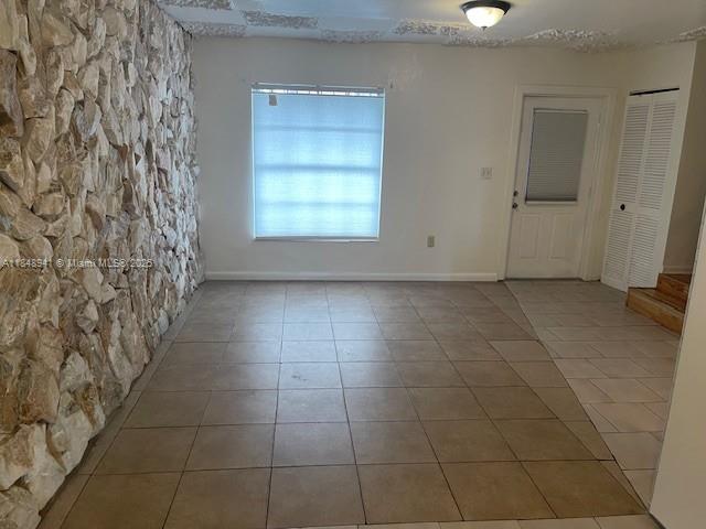 Large 3/1.5 townhome with tiled and wood floors, freshly painted, fenced in back yard, corner unit ready to move in. Unit is located near major highways, entertainment center, shops and public transportation.