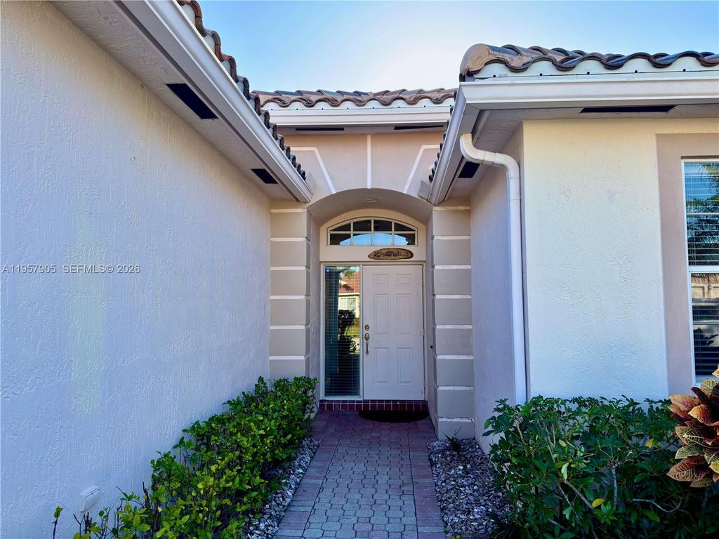 Photo of 21838 Palm Grass Dr, Boca Raton, FL 33428 (MLS # A11957905)