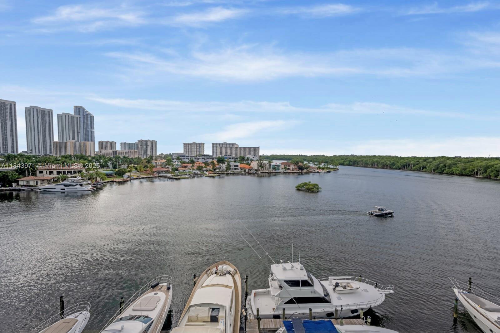 Experience stunning sunsets and sweeping views of the bay, Intracoastal, Oleta River State Park, and Haulover Park from this exceptional residence—just steps from the beach in one of Sunny Isles Beach’s most prestigious new luxury buildings.
This spacious 3-bedroom, 3-bath home offers a desirable flow-through layout that feels more like a private house than a condo. Partially furnished and thoughtfully upgraded with custom closets and window treatments, it’s designed for effortless living and refined comfort.
Enjoy world-class amenities including a full-service spa, fitness center, tennis courts, wet and dry marina, infinity-edge pool, and more. Perfectly located across from Sunny Isles’ newest park and just minutes from Aventura Mall, Bal Harbour Shops, and top-rated schools