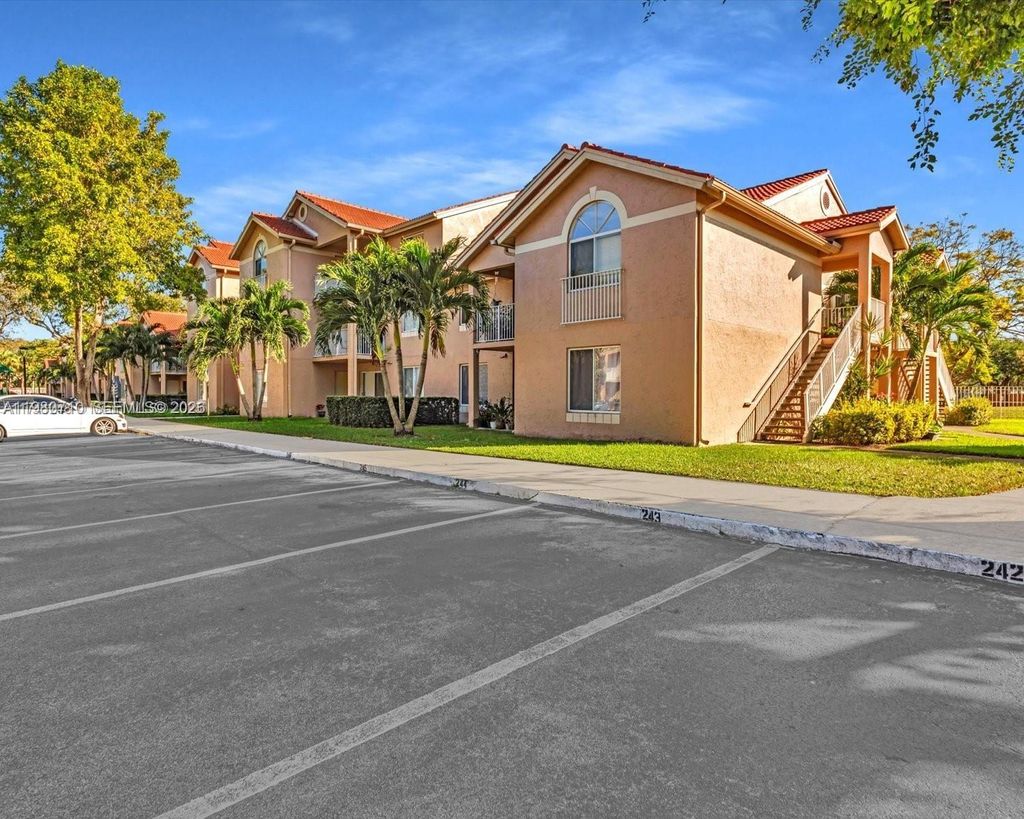 Photo of 15770 SW 106th Ter #303, Miami, FL 33196 (MLS # A11980710)