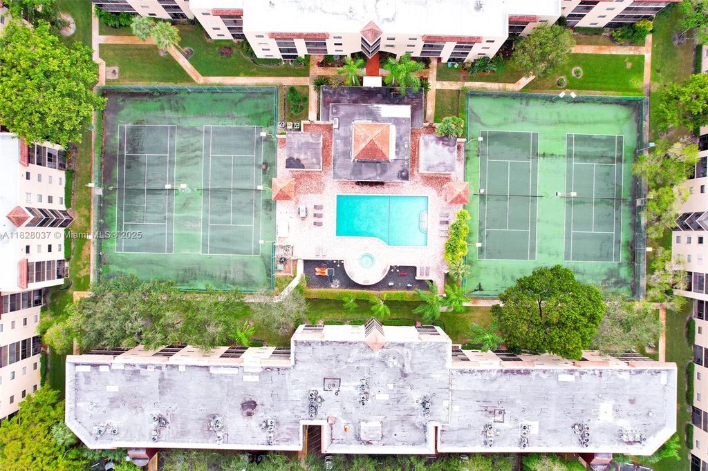 Photo of 10501 W Broward Blvd #304, Plantation, FL 33324 (MLS # A11828037)