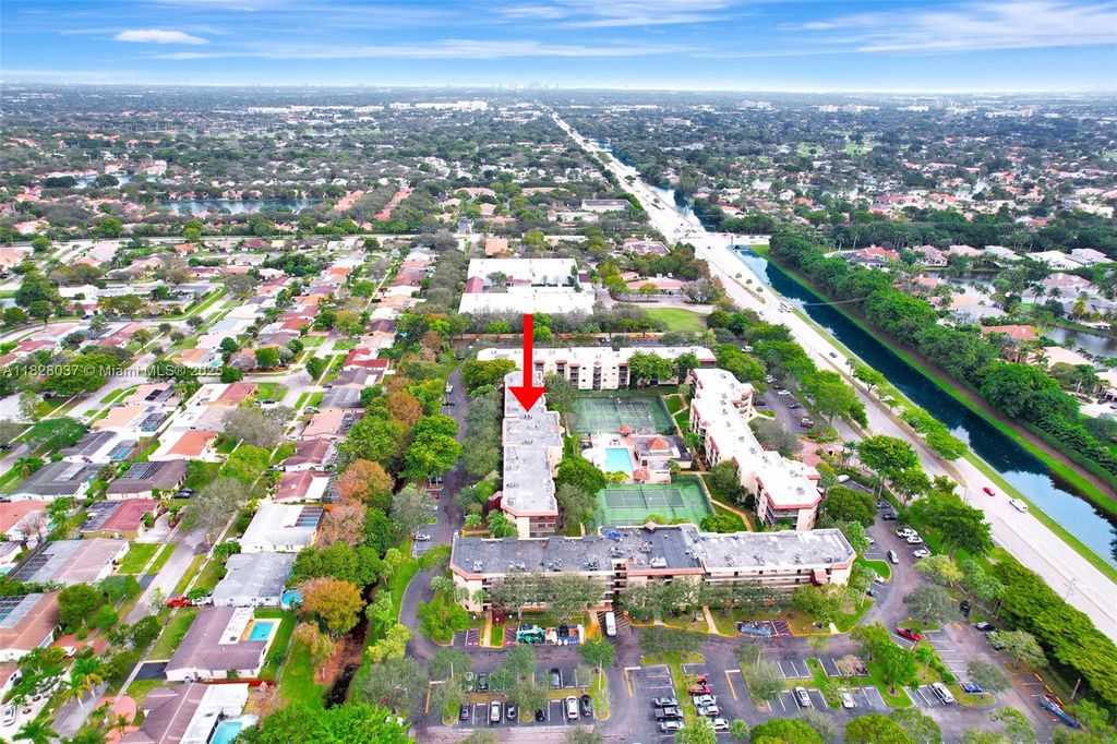 Photo of 10501 W Broward Blvd #304, Plantation, FL 33324 (MLS # A11828037)