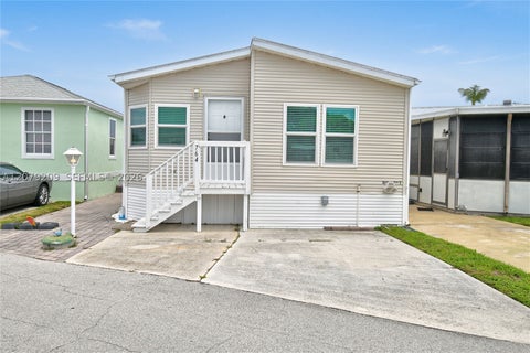 Photo of 10701 S Ocean Dr, Lot 764 DR, Jensen Beach, FL 34957 (MLS # A12079209)