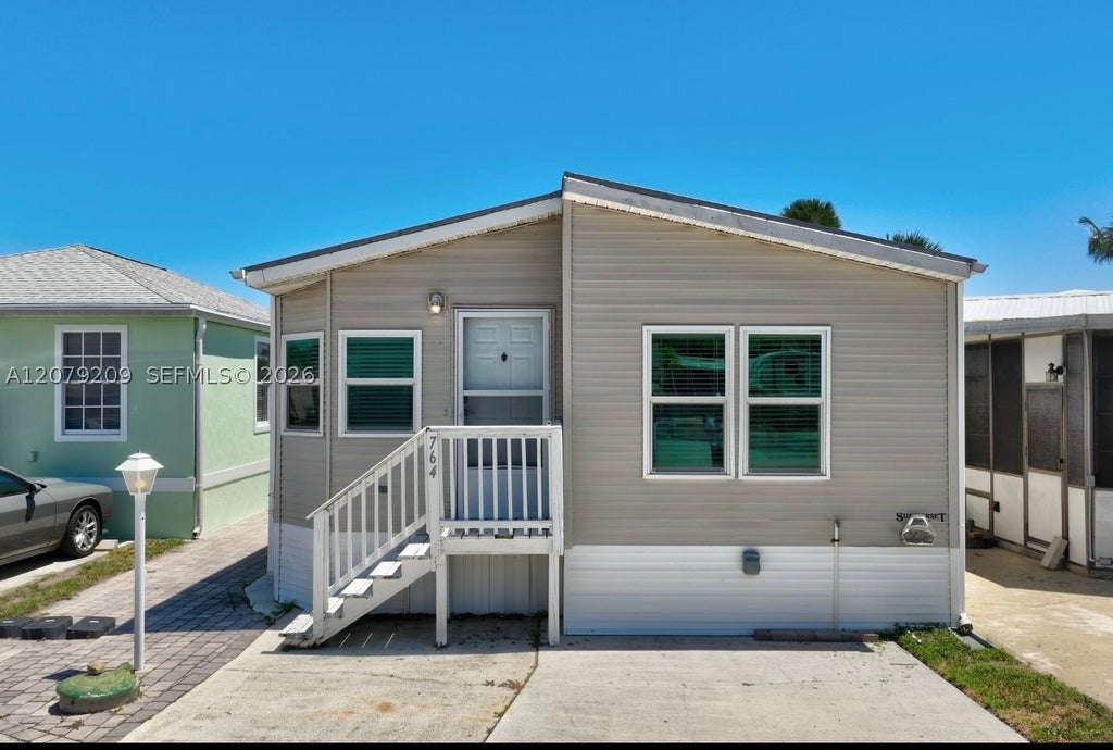 Photo of 10701 S Ocean Dr, Jensen Beach, FL 34957 (MLS # A12079209)