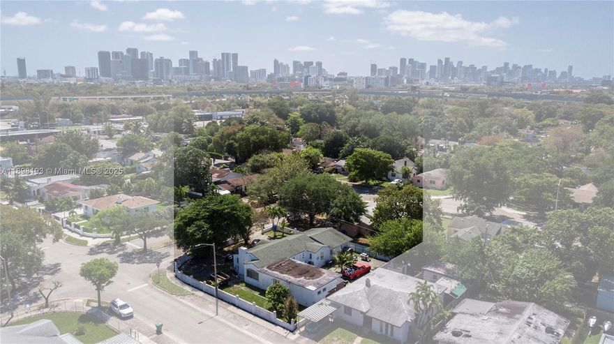 Great investment opportunity in the rapidly growing Bay Vista Park area! This 10,400 sq ft corner lot is currently divided into a 2-bedroom, 2-bathroom house with two attached efficiencies, each with 1 bedroom and 1 bathroom, offering potential rental income. Just a few blocks from the Miami Design District, this property is perfect for a buyer looking to capitalize on the area’s growth. Easy access to major roads and nearby amenities makes it an ideal location for future projects. The lot’s size and prime location provide plenty of opportunities.