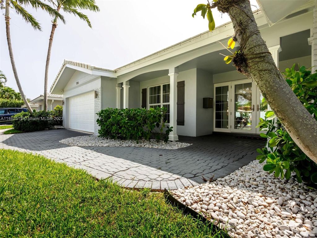 Photo of 1910 NE 59th Pl, Fort Lauderdale, FL 33308 (MLS # A11462515)