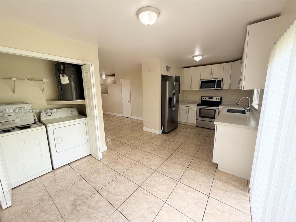 Photo of 7505 Kimberly Blvd #125, North Lauderdale, FL 33068 (MLS # A11992370)