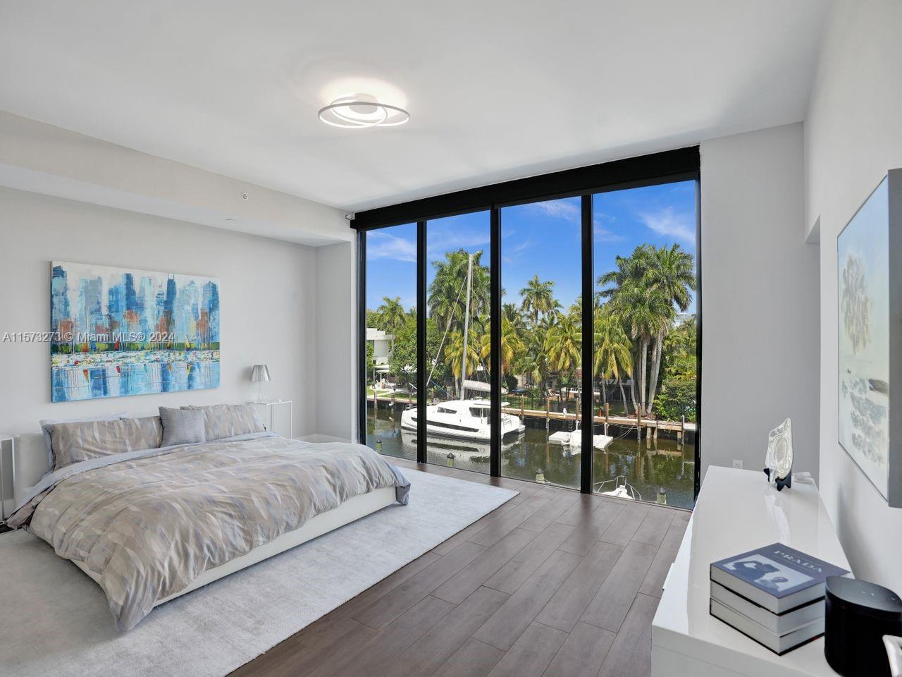 Waterfront gem in heart of America's Venice! Pristine 2590SF condo w/dock & TideSlide mooring sys for <35’ boat & private rooftop terrace w/unparalleled outdoor space. Foyer entry opens to 10’ ceilings, floor2ceiling impact windows & contemporary open flow-thru floorplan. Motorized shades w/panoramic sunrise & sunset views off east & west terraces. Culinary enthusiast's dream kitchen: Wolf gas stove, wall oven, wine fridge, & sleek Italian cabinets. Entertain guests w/ease: counter seating & large formal DR. Big primary suite beckons 2 walk-in closets & spa-style bath area. 3rd BR cleverly utilized as open den/office space for today's flexible lifestyle. 2 garage spots, storage room, kayak/SUP racks, salt-water pool, fitness room+. Steps to Las Olas, walk to beach, shops etc. 1YR warranty