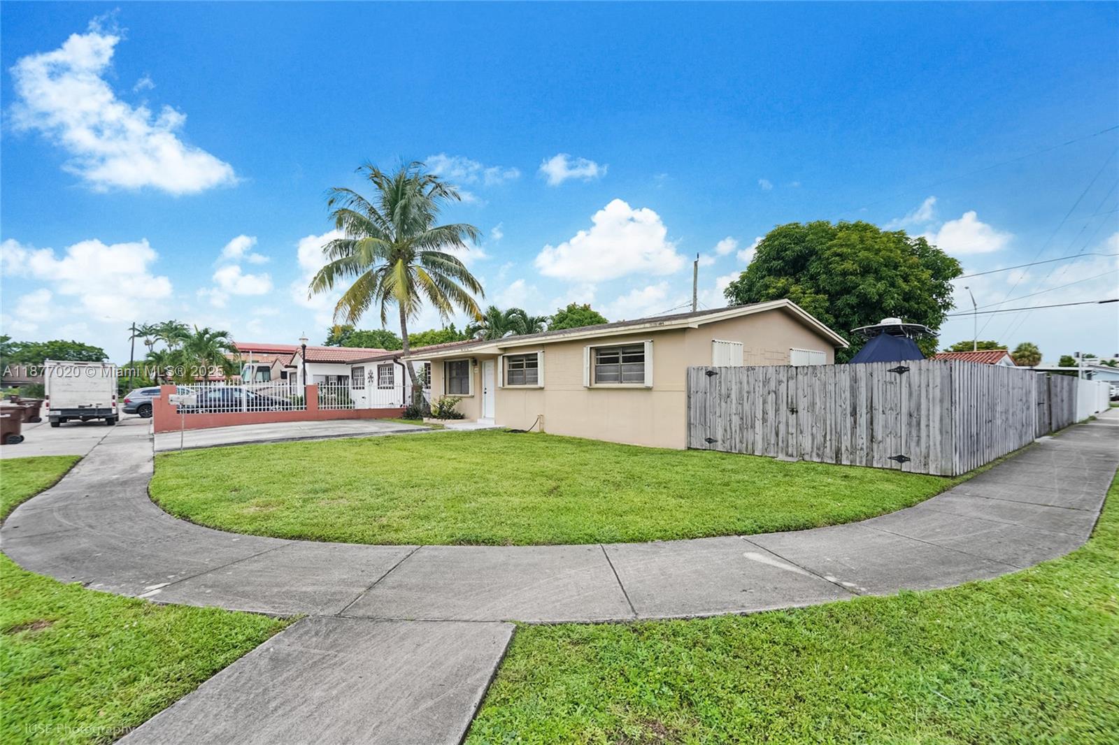 Corner lot home in Hialeah with endless potential! Features side gate with extra parking, space for RV or boat, and room to add a pool. Large fenced yard with mature mango tree. Prime location near major highways, shopping, dining, and just minutes from Amelia Earhart Park. Perfect opportunity to make it your own!