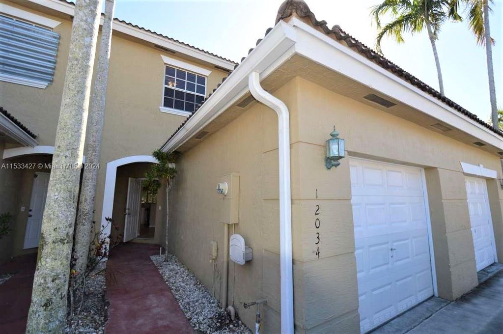 Photo of 12034 SW 5th Ct #12034, Pembroke Pines, FL 33025 (MLS # A11533427)