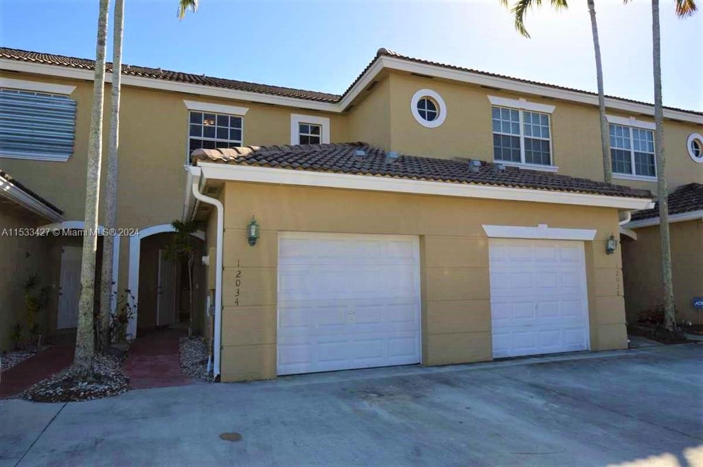 Photo of 12034 SW 5th Ct #12034, Pembroke Pines, FL 33025 (MLS # A11533427)