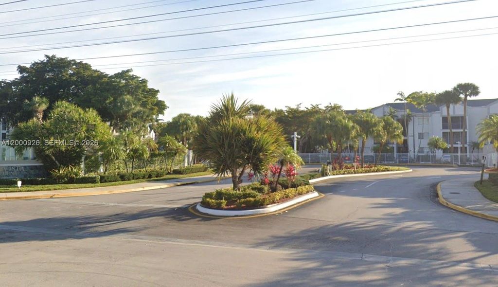 Photo of 5654 Rock Island Rd #227, Tamarac, FL 33319 (MLS # A12000926)