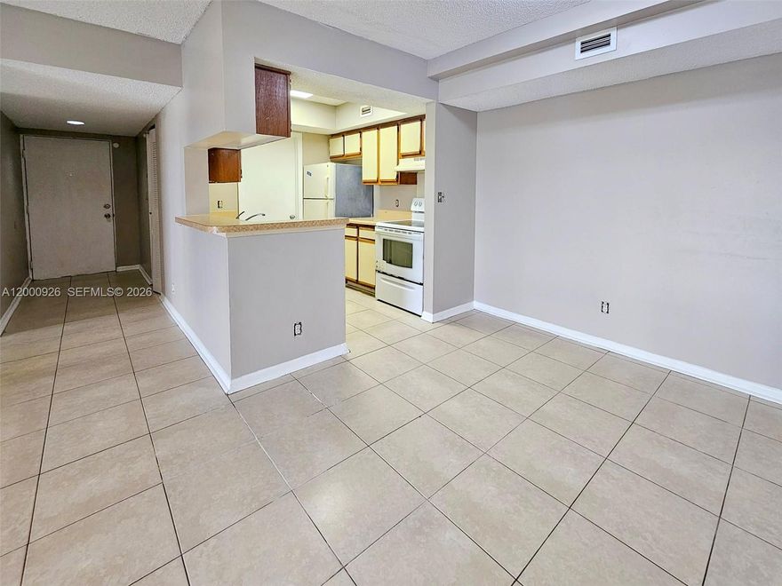 Great opportunity for a primary residence or investment in a well-situated area of Tamarac! This unit offers a comfortable and functional layout with bright living and dining areas that create a welcoming atmosphere. The kitchen provides ample cabinet space and practicality for everyday living. The primary bedroom is generously sized with good closet storage, while the additional bedroom offer flexibility for guests, a home office, or other needs.

The community offers convenient access to major roadways, shopping, dining, and everyday essentials. Assigned and guest parking may be available per association guidelines.
Freshly painted and new floors