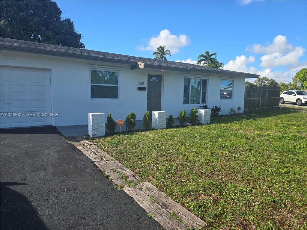 Photo of 3531 NW 26th St, Lauderdale Lakes, FL 33311 (MLS # A12003607)