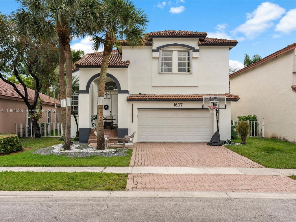 Photo of 1607 SW 157th Ave, Pembroke Pines, FL 33027 (MLS # A11994523)