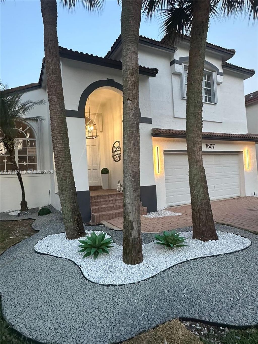 Photo of 1607 SW 157th Ave, Pembroke Pines, FL 33027 (MLS # A11994523)